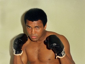 FILE - This is an Oct. 9, 1974, file photo showing Muhammad Ali.  Ali, the magnificent heavyweight champion whose fast fists and irrepressible personality transcended sports and captivated the world, has died according to a statement released by his family Friday, June 3, 2016. He was 74.
