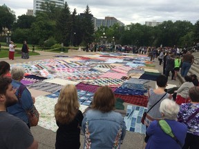 More than 100 people rallied at the Legislature on the one-year anniversary of the release of the Truth and Reconciliation Commission report. 
(David Larkins/Winnipeg Sun/Postmedia Network)