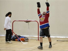 Justin Herbert celebrates a goal during a floor hockey game at the Boyle Street Community League. David Bloom photo.