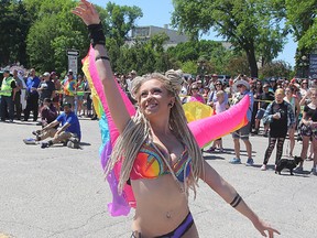 Erica Pauls dances during the Gay Pride parade in Winnipeg, Man. Sunday June 05, 2016.
Brian Donogh/Winnipeg Sun/Postmedia Network