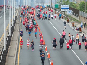 Cyclists and runners took over the Gardiner Expressway and the Don Valley Parkway for the Becel Ride for Heart. (ERNEST DOROSZUK, Toronto Sun)