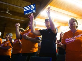Members of Fort City Church sing during their re-entry worship service on June 5, 2016, in Fort McMurray.