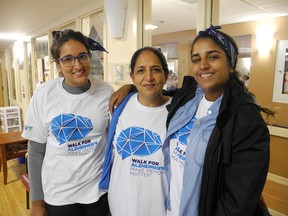 Bela Ravi, centre, along with daughters Alisha, left, and Nikita, helped raise about $3,000 for the local Walk for Alzheimer's Sunday. (Harold Carmichael/Sudbury Star)