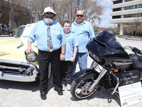 Ward 3 Coun. Gerry Montpellier, left, poses with Bob Johnston, an organ recipient, and son Bob Jr. The group was promoting the first Cruising for Organs and Rich fundraiser on June 12. Participants will drive classic cars and motorcycles around the city to encourage organ donation and raise money for local people who must travel for transplants. (Gino Donato/Sudbury Star)