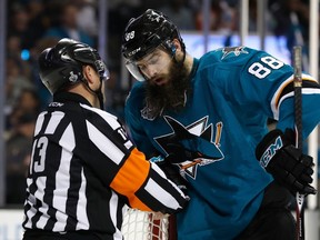 Brent Burns of the San Jose Sharks speaks with referee Dan O'Halloran in Game Three of the Stanley Cup fianl against the Pittsburgh Penguins in San Jose at SAP Center on June 4, 2016. (Christian Petersen/Getty Images/AFP)