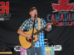 Dustin Farr from Olds Alta., whose hobby is music, came to Drayton Valley recently to raise money for Fort McMurray. His song “We are Alberta” recently became popular on Facebook.