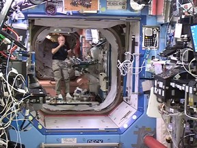 In this image from video provided by NASA, NASA astronaut Jeff Williams floats inside the Bigelow Expandable Activity Module (BEAM) Monday, June 6, 2016. (NASA via AP)