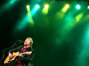 Country music star Travis Tritt performs an acoustic concert in the Ohrstrom Bryant Theater at Shenandoah University in Winchester, Va. earlier this year. He'll play Club Regent next month. (Jeff Taylor/The Winchester Star via AP file photo)