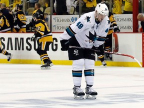 San Jose Sharks' Tomas Hertl, right, skates off the ice after the Pittsburgh Penguins defeated the Sharks 3-2 in Game 1 of the Stanley Cup final series on May 30, 2016, in Pittsburgh. THE CANADIAN PRESS/AP-Keith Srakocic, File