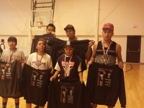 Dawn Many Guns, Ashton Yellow Horn, Joseph Plain Eagle, Riley North Peigan, Isiah North Peigan, Josh Cross Child and Chris Scout played as the “Young Guns,” and took home the gold medal during the Piitaapoyi Group’s basketball tourney that was held on May 21. | Submitted photo