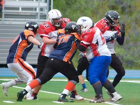 Six football players from Pincher Creek represented Alberta during the ABC Border Bowl in May. Although they were defeated 28-0, head coach Chris Ney said that the players did their best and had a great time. | Submitted photo