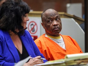 In this Feb. 6, 2015, file photo, Lonnie Franklin Jr., who has been dubbed the "Grim Sleeper" serial killer, looks back at his attorney, Louisa Pensanti, during a court hearing in Los Angeles. In May, 2016, Franklin was convicted of 10 counts of first-degree murder last month for crimes dating back more than 30 years. On Monday, June 6, 2016, jurors recommend the death penalty for Franklin for murdering nine women and a teenage girl. (AP Photo/Nick Ut,File)