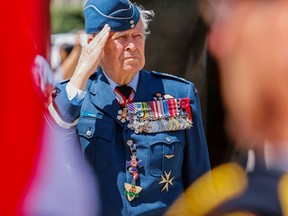 Veteran Richard Rohmer salutes a Colour Guard during Toronto's commeration of the 72nd anniversary of D-Day at Nathan Philips Square Monday June 6, 2016. (Dave Thomas/Toronto Sun)