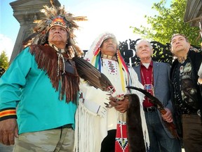 Order of Canada recipient Douglas Cardinal, an architect and native elder (second from right) stood at the gates with other chiefs from the Confederation of Aboriginal People of Canada. (Julie Olive, Postmedia)