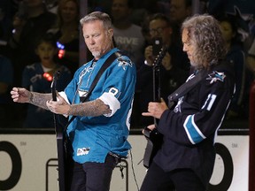 Metallica's James Hetfield (left) and Kirk Hammett perform the American national anthem prior to Game 4 of the Stanley Cup final between the Penguins and Sharks in San Jose, Calif., on Monday, June 6, 2016. (Ben Margot/AP Photo)