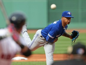 Marcus Stroman of the Toronto Blue Jays delivers a pitch in the first inning during his team's game against the Boston Red Sox at Fenway Park on June 4, 2016 in Boston, Mass. (ADAM GRANZMAN/Getty Images/AFP)
== FOR NEWSPAPERS, INTERNET, TELCOS & TELEVISION USE ONLY ==