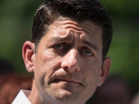 In answer to a reporter's question, House Speaker Paul Ryan of Wis. said Donald Trump's comments about an American-born judge of Mexican heritage are the "textbook definition of a racist comment," during a news conference about his agenda to relieve poverty in America, Tuesday, June 7, 2016, in Washington. But Ryan, who endorsed Trump only last week after a lengthy delay, went on to say: "But do I believe Hillary Clinton is the answer? No, I do not." (AP Photo/J. Scott Applewhite)