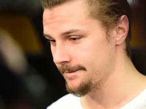 Ottawa Senators' captain Erik Karlsson speaks to reporters as the team clears out of the locker room in Ottawa at the end of the NHL season on April 11, 2016. (THE CANADIAN PRESS/Justin Tang)
