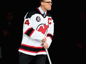 Former New Jersey Devils captain Scott Stevens skates on the ice during a ceremony to celebrate the 20 year anniversary of the 1995 New Jersey Devils Stanley Cup win during a ceremony before the game against the Philadelphia Flyers on March 8, 2015 at the Prudential Center in Newark, New Jersey.  (Elsa/Getty Images/AFP)