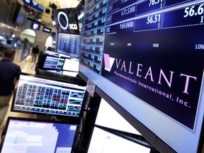 In this March 15, 2016 file photo, a trading post on the floor of the New York Stock Exchange displays the Valeant Pharmaceuticals logo. Valeant Pharmaceuticals saw its stock tank Tuesday to its lowest level in nearly six years after the Quebec-based drug giant slashed it outlook for the year and reported disappointing first-quarter results. THE CANADIAN PRESS/AP/Richard Drew