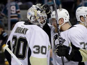Patric Hornqvist of the Pittsburgh Penguins celebrates with Matt Murray after defeating the San Jose Sharks 3-1 in Game 4 of the Stanley Cup Final at SAP Center on June 6, 2016 in San Jose. (Bruce Bennett/Getty Images/AFP)