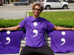 Tai Hope, 16 of Woodstock Collegiate Institute in Woodstock with the purple shirts featuring a semi-colon. (MIKE HENSEN, The London Free Press)