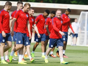 England's players arrive for a training session at Stade de Bourgognes in Chantilly, France on, June 7, 2016. (AP Photo/Kirsty Wigglesworth)