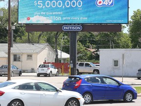 Traffic moves past a digital billboard on Pembina Highway. (Brian Donogh/Winnipeg Sun)