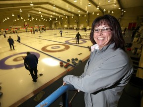 Karen Rosser poses for a photo at the Heather Curling Club in 2011. The curling club has revitalized itself with an aggressive membership push. (FILE PHOTO)