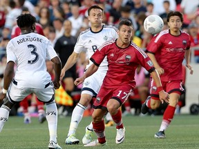 Fury FC’s Carl Haworth keeps his eyes focused on the ball during the first leg of the Canadian championship semifinal against the Vancouver Whitecaps. (Julie Oliver, Postmedia Network)
