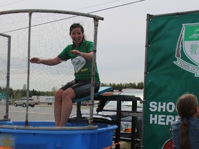 Lisa Humphreys owner of Tim Hortons took a dip for the kids as she was dunked a few times to help raise money for Camp Day.