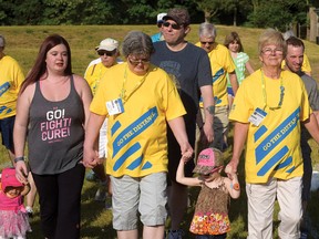 Multiple generations walked in Tillsonburg's 15th annual Relay for Life Friday at Memorial Park. (CHRIS ABBOTT/TILLSONBURG NEWS)