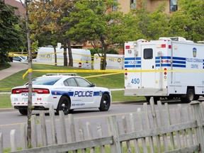 Peel Regional Police investigate the scene of a shooting early Wednesday June 8, 2016 in Brampton. The SIU has taken over the case. (Nick Westoll/Toronto Sun)