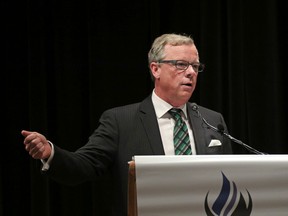 Brad Wall, Premier of Saskatchewan, talks to  energy industry executives at a luncheon hosted by The Explorers and Producers Association of Canada (EPAC) at Calgary's Petroleum Club on Wednesday June 8, 2016. 
Gavin Young/Postmedia