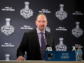 Peter DeBoer of the San Jose Sharks speaks to members of the media after losing 3-1 in Game 4 of the Stanley Cup final to the Pittsburgh Penguins at SAP Center in San Jose on June 6, 2016. (Bruce Bennett/Getty Images/AFP)