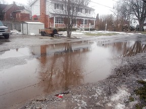 File picture: Mary Street, shown here in 2013, would turn into a large lake after a rainstorm or after the snow melted for over three years. Residents said that after dealing with the issue for the past three years, the municipality recently fixed the problem.