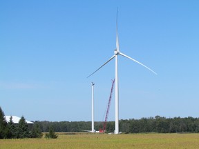Wind turbines towers and a crane are shown in a farm field on Aberarder Line in Plympton-Wyoming on September 21, 2015 in Sarnia, Ont. Paul Morden/Sarnia Observer/Postmedia Network