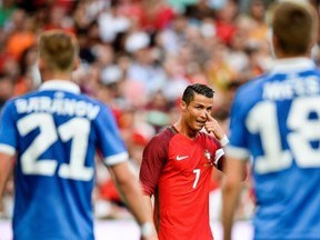Portugal's forward Cristiano Ronaldo gestures during a friendly match between Portugal and Estonia at Luz stadium in Lisbon on June 8, 2016. (AFP PHOTO/PATRICIA DE MELO MOREIRA)