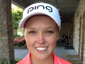 Brooke Henderson shows off her new putter. (Chris Stevenson, Special to Postmedia Network)