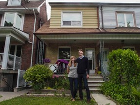 Lyndall Schumann poses for a photo with her husband Jordan Thomson in Toronto, Wednesday, June 8, 2016. Schumann and her husband have been living frugally and saving since finishing their undergraduate degrees.THE CANADIAN PRESS/Eduardo Lima