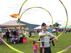 In this file photo, Cpl. Joshua Shand, of Sarnia's Royal Canadian Air Cadets squadron watches his paper airplane sail through hoops at a previous Sarnia Kids Funfest. This year's 21st edition of the annual family event is set for Saturday, 10 a.m. to 3 p.m., at the Clearwater Arena. (File photo)