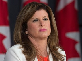 Interim Opposition Conservative Leader Rona Ambrose listens to a question during a news conference in Ottawa, Thursday June 9, 2016. THE CANADIAN PRESS/Adrian Wyld