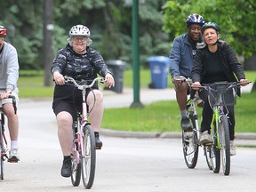 A group of cyclists ride along Wellington Crescent earlier this week. (Brian Donogh/Winnipeg Sun file photo)