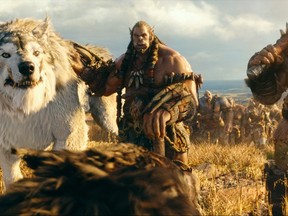 (L to R) Orc chieftain Durotan (Toby Kebbell) leads his Frostwolf Clan alongside his second-in-command, Orgrim (Rob Kazinsky), in Legendary Pictures and Universal Picturesí "Warcraft." (Legendary Pictures)