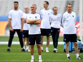France's head coach Didier Deschamps looks on during a training session by the French national football team at the Stade de France stadium in Saint-Denis on June 9, 2016. (AFP PHOTO/FRANCK FIFE)