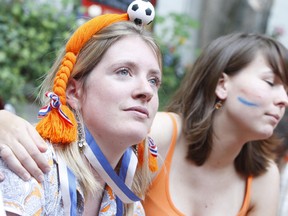 Dutch fans at Betty's on King St. watch their home team lose 3-1 to the Russians in extra time at the European Championship on June 21, 2008. (Postmedia)
