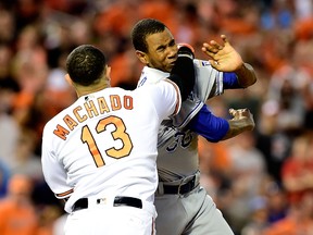 Manny Machado (left) of the Orioles throws a punch at Royals pitcher Yordano Ventura (right) during MLB action in Baltimore on June 7, 2016. (Patrick McDermott/Getty Images/AFP)