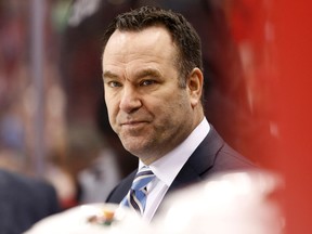 Minnesota Wild head coach John Torchetti looks on from behind the bench against the Washington Capitals in the third period at Verizon Cente in Washington on Feb. 26, 2016. (Geoff Burke/USA TODAY Sports)