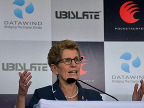 Ontario Premier Kathleen Wynne makes a speech in India on January 31, 2016. NARINDER NANU/AFP/Getty Images