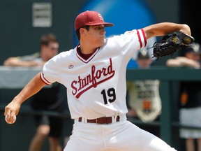 In this June 7, 2015, file photo, Stanford pitcher Cal Quantrill throws to a Vanderbilt batter during the NCAA Super Regional tournament in Nashville, Tenn. (AP Photo/Wade Payne, File)